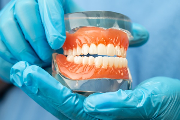 When You Should Choose Denture Repair Vs Replacement